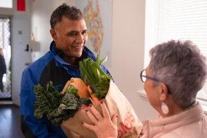 Volunteer receiving food donation